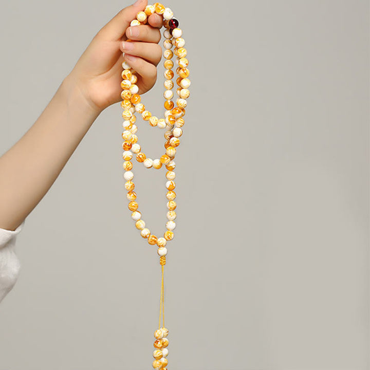 Mala tibetano in ambra bianca e gialla con 108 perle Buddha Stones - image 4