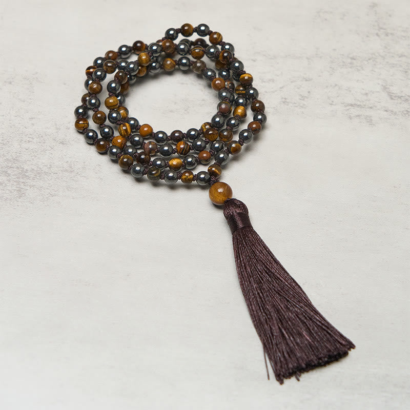 Mala con 108 Buddha Stones, occhio di tigre, ematite e nappa, coraggio e forza - Occhio di tigre ed ematite - image 0