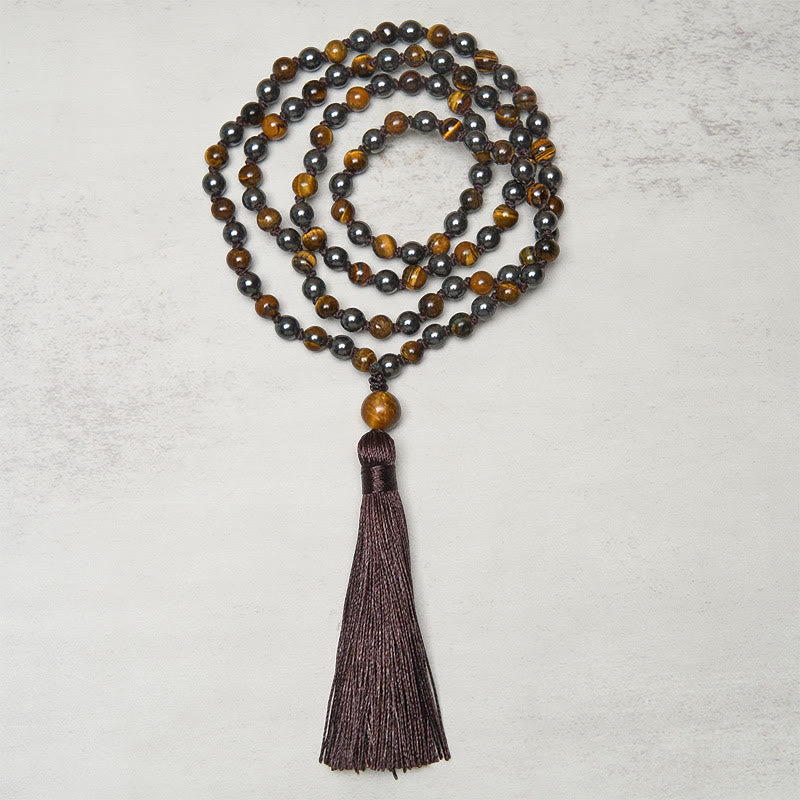 Mala con 108 Buddha Stones, occhio di tigre, ematite e nappa, coraggio e forza - image 1