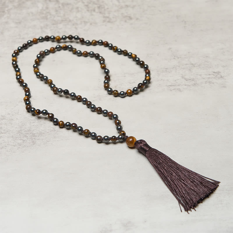 Mala con 108 Buddha Stones, occhio di tigre, ematite e nappa, coraggio e forza - image 2