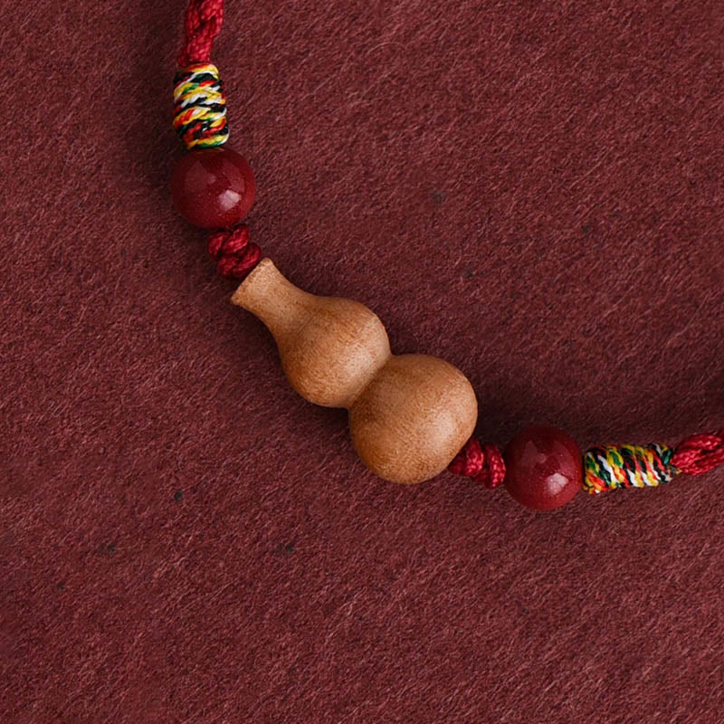 Braccialetto regolabile per la fortuna e la ricchezza, in corda di legno di pesca Buddha Stones - image 1