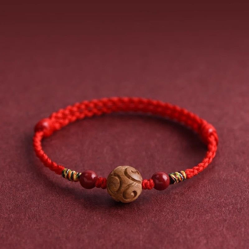 Braccialetto portafortuna in corda di legno di pesco naturale con motivo di buon auspicio intagliato Buddha Stones - image 0