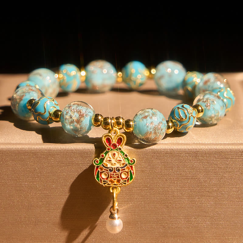 Braccialetto portafortuna in vetro Liuli con coniglio Buddha Stones - image 1