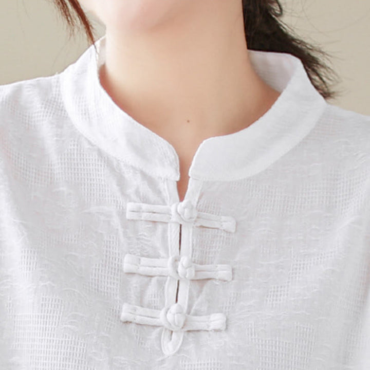 Camicia da donna in cotone con colletto rialzato, maniche a tre quarti ricamate, bottoni a rana in jacquard Buddha Stones - image 21