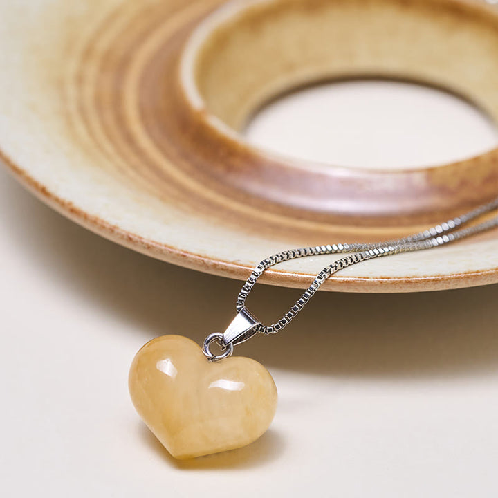 Collana con ciondolo a forma di cuore in Buddha Stones, ametista, topazio, cristallo rosa, opale, occhio di tigre, cristallo bianco, diaspro rosso, amazzonite, avventurina verde, ossidiana nera, citrino. - image 7