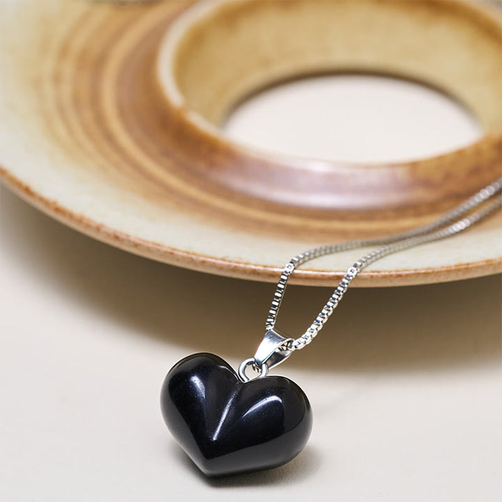 Collana con ciondolo a forma di cuore in Buddha Stones, ametista, topazio, cristallo rosa, opale, occhio di tigre, cristallo bianco, diaspro rosso, amazzonite, avventurina verde, ossidiana nera, citrino. - image 42