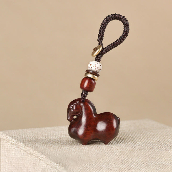 Buddha Stones Portachiavi con foglia piccola in sandalo rosso "Anno del cavallo" - Sandalo rosso a foglia piccola - image 0