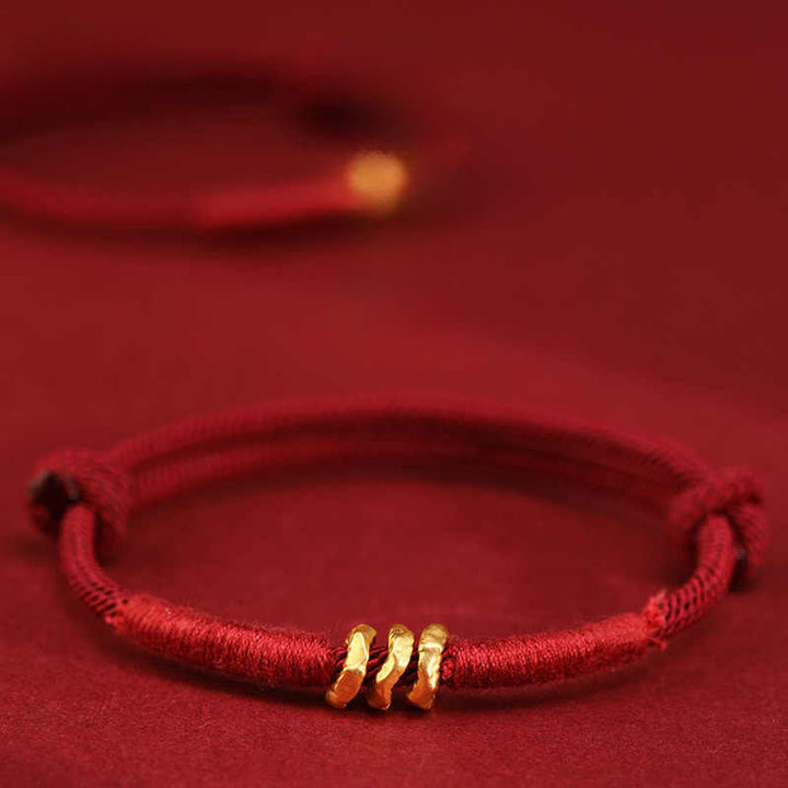 Buddha Stones Braccialetto alla cavigliera in corda rossa intrecciata a mano con design ad anello in oro 999 - Cavigliera con tre perle - Cavigliera (circonferenza della cavigliera 19-23 cm) - image 0