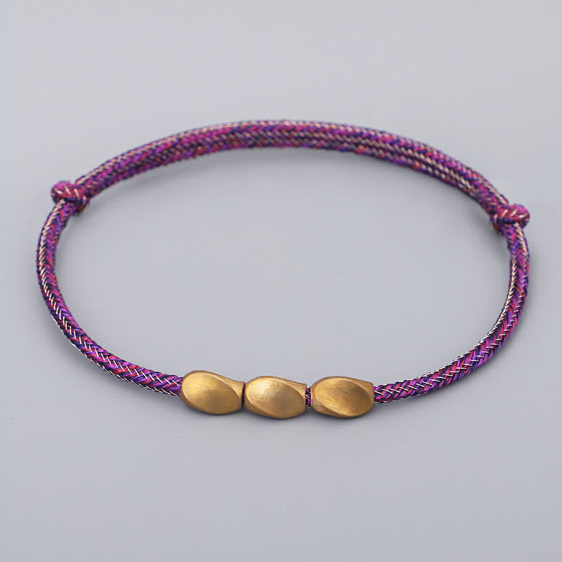 Buddha Stones Bracciale con perline di rame dorato e filo multicolore. - Rosa scuro - image 5