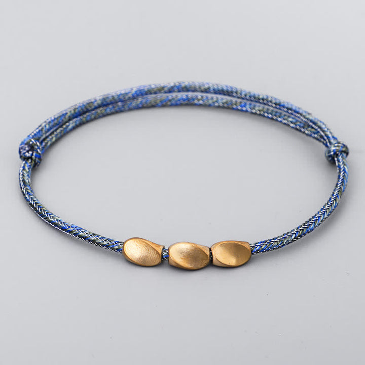 Buddha Stones Bracciale con perline di rame dorato e filo multicolore. - Blu scuro - image 11