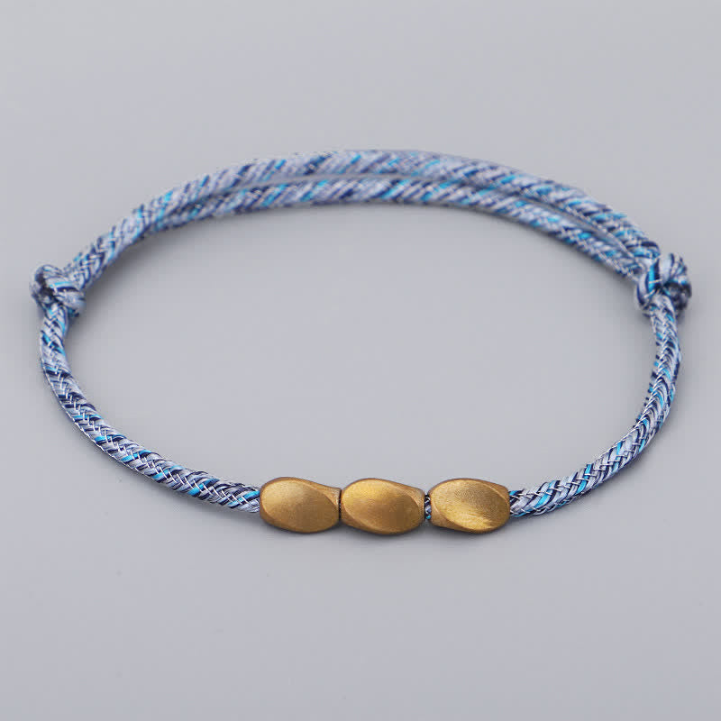 Buddha Stones Bracciale con perline di rame dorato e filo multicolore. - Blu celeste - image 7