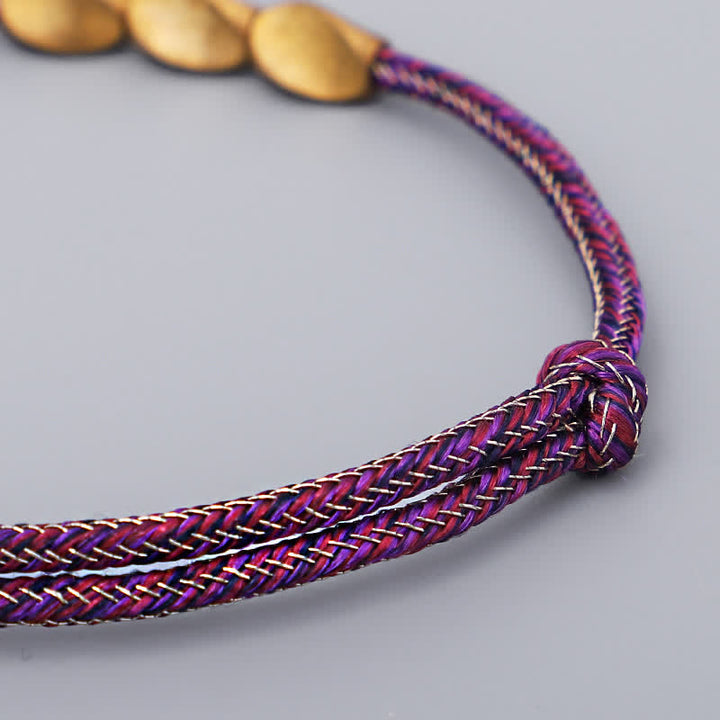Buddha Stones Bracciale con perline di rame dorato e filo multicolore. - image 6