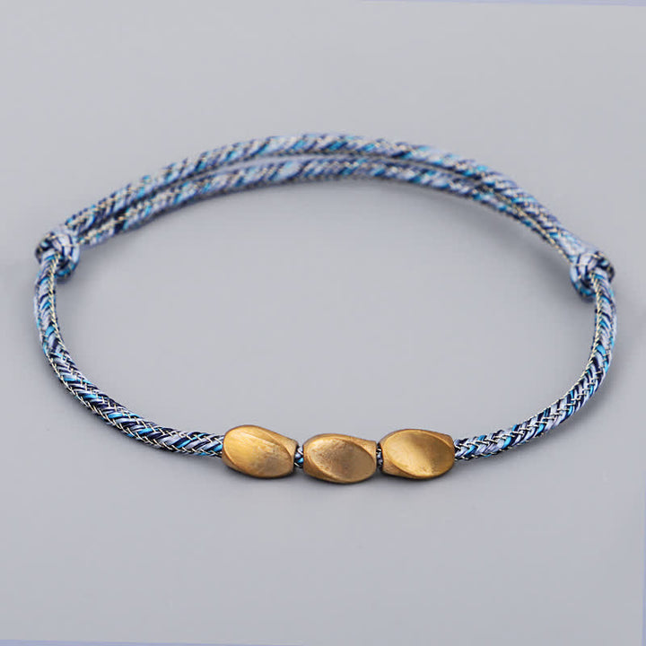 Buddha Stones Bracciale con perline di rame dorato e filo multicolore. - Blu - image 8