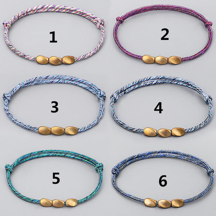 Buddha Stones Bracciale con perline di rame dorato e filo multicolore. - image 15