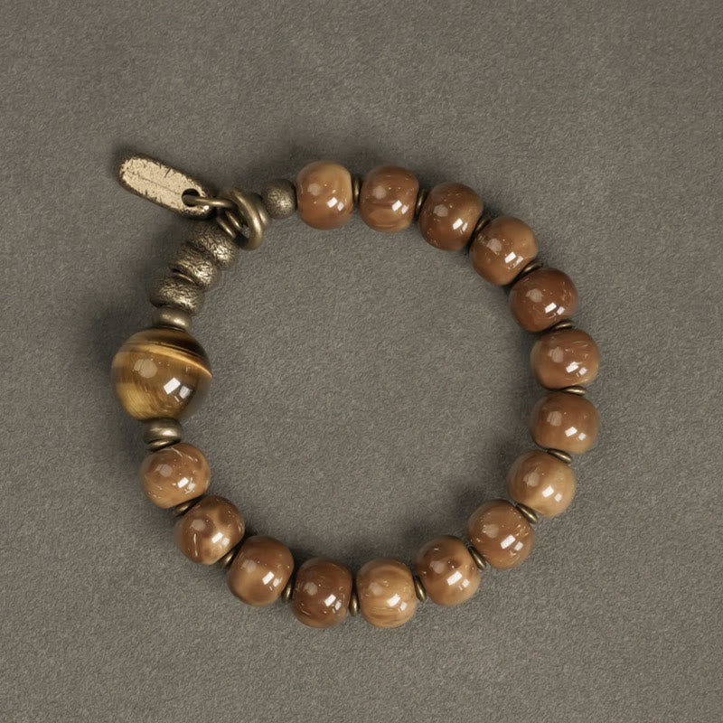 Braccialetto per la fortuna, in ottone, rame e ossidiana , Buddha Stones , semi di Kuka, occhio di tigre e oro lucido - image 2