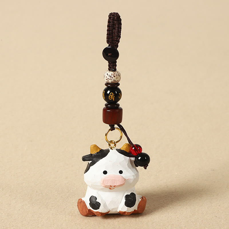 Buddha Stones Portachiavi in ​​legno di tiglio inciso con zodiaco cinese, fiore di pruno, pace e sicurezza, Om Mani Padme Hum, simbolo positivo. - Ox 4cm (Colore, forma e dimensioni possono variare) - Om Mani Padme Hum - image 13