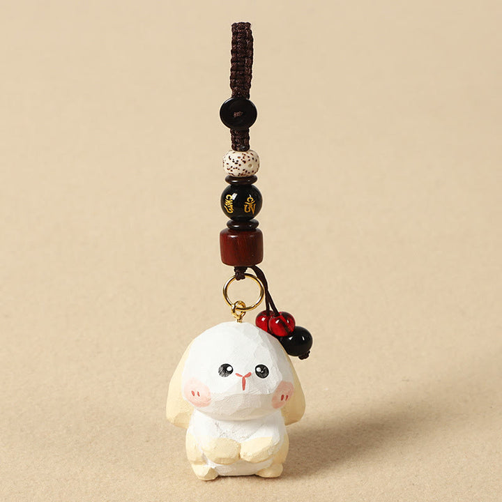 Buddha Stones Portachiavi in ​​legno di tiglio inciso con zodiaco cinese, fiore di pruno, pace e sicurezza, Om Mani Padme Hum, simbolo positivo. - Coniglio di 4 cm (colore, forma e dimensioni possono variare) - Om Mani Padme Hum - image 19