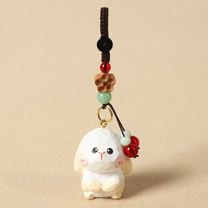 Buddha Stones Portachiavi in ​​legno di tiglio inciso con zodiaco cinese, fiore di pruno, pace e sicurezza, Om Mani Padme Hum, simbolo positivo. - Coniglio di 4 cm (colore, forma e dimensioni possono variare) - Fiore di pruno - image 20