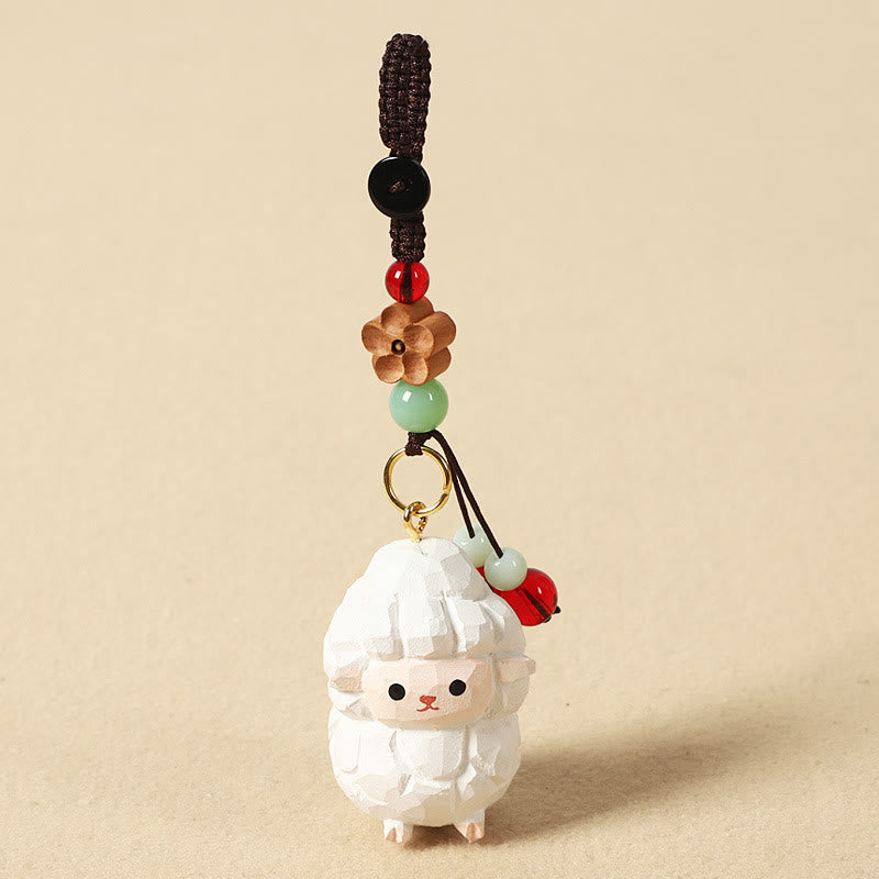 Buddha Stones Portachiavi in ​​legno di tiglio inciso con zodiaco cinese, fiore di pruno, pace e sicurezza, Om Mani Padme Hum, simbolo positivo. - Capra 4 cm (colore, forma e dimensioni possono variare) - Fiore di pruno - image 1