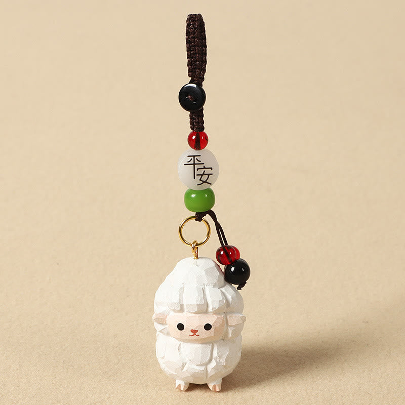 Buddha Stones Portachiavi in ​​legno di tiglio inciso con zodiaco cinese, fiore di pruno, pace e sicurezza, Om Mani Padme Hum, simbolo positivo. - Capra 4 cm (colore, forma e dimensioni possono variare) - Pace e sicurezza - image 2