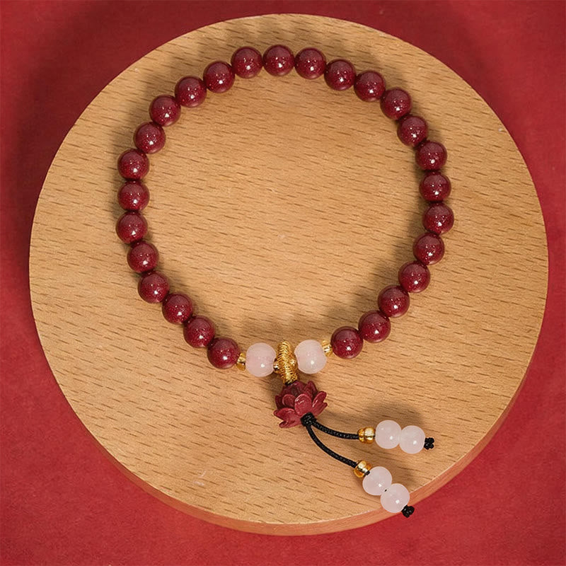 Buddha Stones Bracciale dell'Illuminazione al Loto in Cinnabro - Cinabro da 6 mm (Circonferenza del polso: 14–15 cm) - image 0