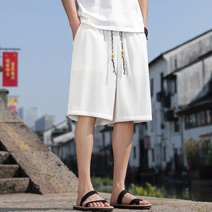 Pantaloncini Bermuda da uomo, tinta unita, con coulisse e tasche, con stampa Buddha Stones, ideali per l'estate. - image 1