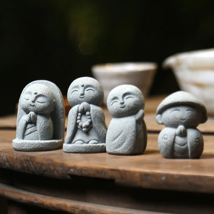 Buddha Stones Piccola statua in resina del Buddha Ksitigarbha in preghiera, raffigurante la compassione e la meditazione. - image 22