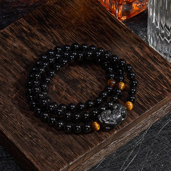 Buddha Stones Bracciale PiXiu con perline intagliate a mano in ossidiana arcobaleno e ossidiana nera, simbolo di ricchezza. - image 11