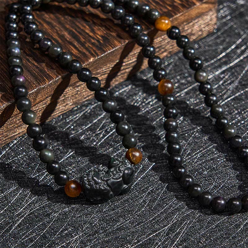 Buddha Stones Bracciale PiXiu con perline intagliate a mano in ossidiana arcobaleno e ossidiana nera, simbolo di ricchezza. - image 5
