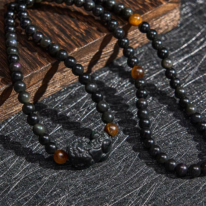 Buddha Stones Bracciale PiXiu con perline intagliate a mano in ossidiana arcobaleno e ossidiana nera, simbolo di ricchezza. - image 5