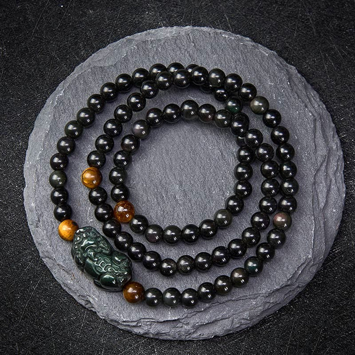Buddha Stones Bracciale PiXiu con perline intagliate a mano in ossidiana arcobaleno e ossidiana nera, simbolo di ricchezza. - Perla di ossidiana arcobaleno (il colore cambia a seconda della luce) - 6 mm - image 0
