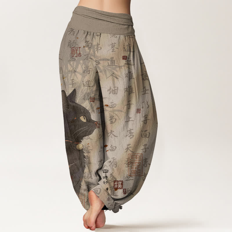Buddha Stones Pantaloni harem da donna in puro cotone con elastico in vita e fantasia a calligrafia di gatti neri. - image 1