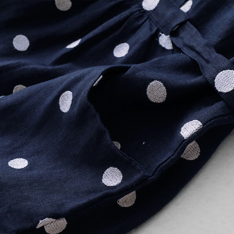 Abito midi da donna con scollo a V, lacci e tasche, con stampa a pois e motivo Buddha Stones. - image 6