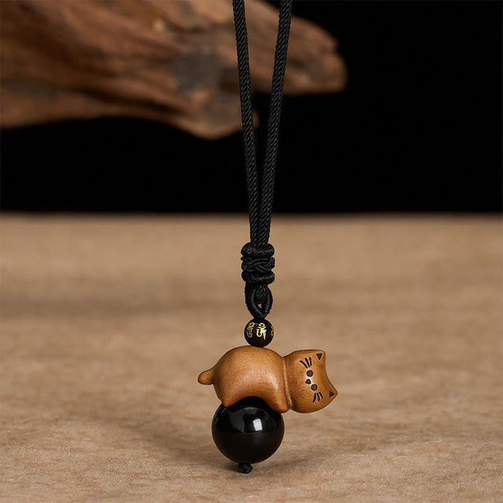 Buddha Stones Collana con perline di sandalo, gatto, ossidiana nera, Om Mani Padme Hum, perline di protezione. - Sandalo e ossidiana nera - image 0