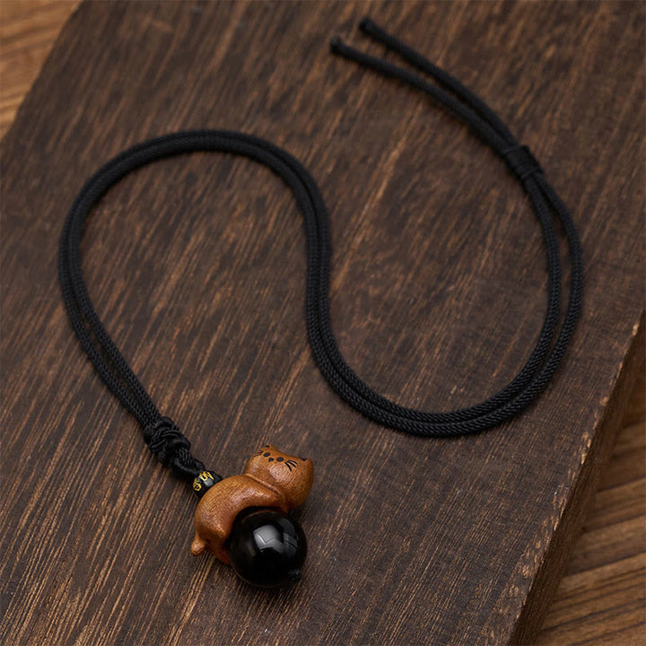 Buddha Stones Collana con perline di sandalo, gatto, ossidiana nera, Om Mani Padme Hum, perline di protezione. - image 4