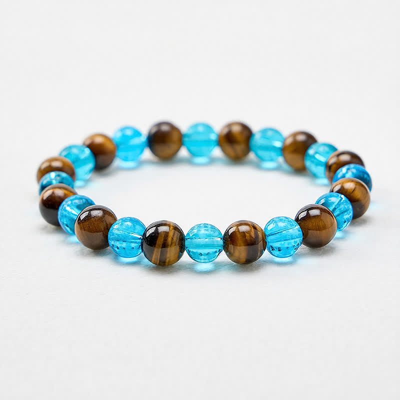 Buddha Stones Braccialetto rotondo con perline di vetro Tiger Eye Blue Liuli, colore Courage. - image 1