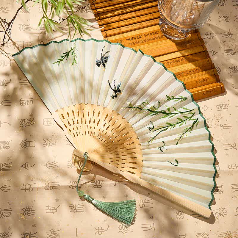 Buddha Stones Vintage Bamboo Orchid Willows Swallows Floral Pattern Growth Nassel Bamboo Folding Fan - Rondini di Willows (Dimensioni da chiuse: circa 21 cm / 8,3 pollici) - image 0