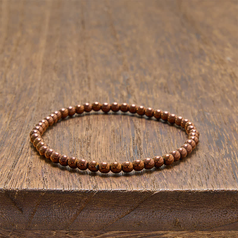 Buddha Stones Set di 2 braccialetti minimalisti rotondi in ematite per la messa a terra. - image 9