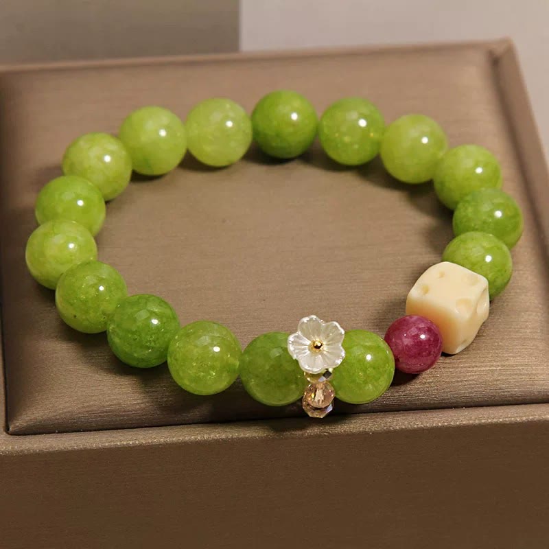 Buddha Stones Braccialetto curativo con ciondolo a forma di fiore di peridoto e perline - image 1