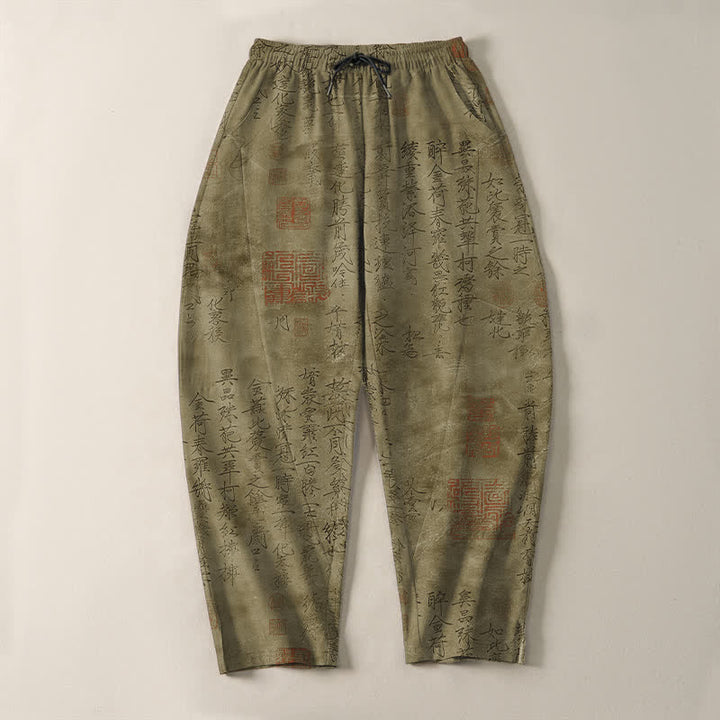 Buddha Stones Pantaloni da uomo affusolati in puro cotone con coulisse e tasche, motivo a sigillo con calligrafia vintage. - image 2