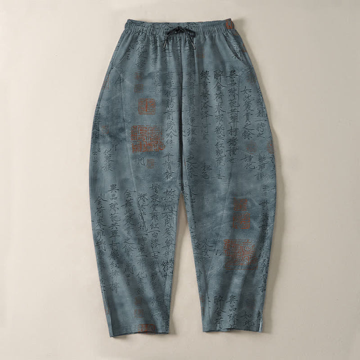 Buddha Stones Pantaloni da uomo affusolati in puro cotone con coulisse e tasche, motivo a sigillo con calligrafia vintage. - image 9