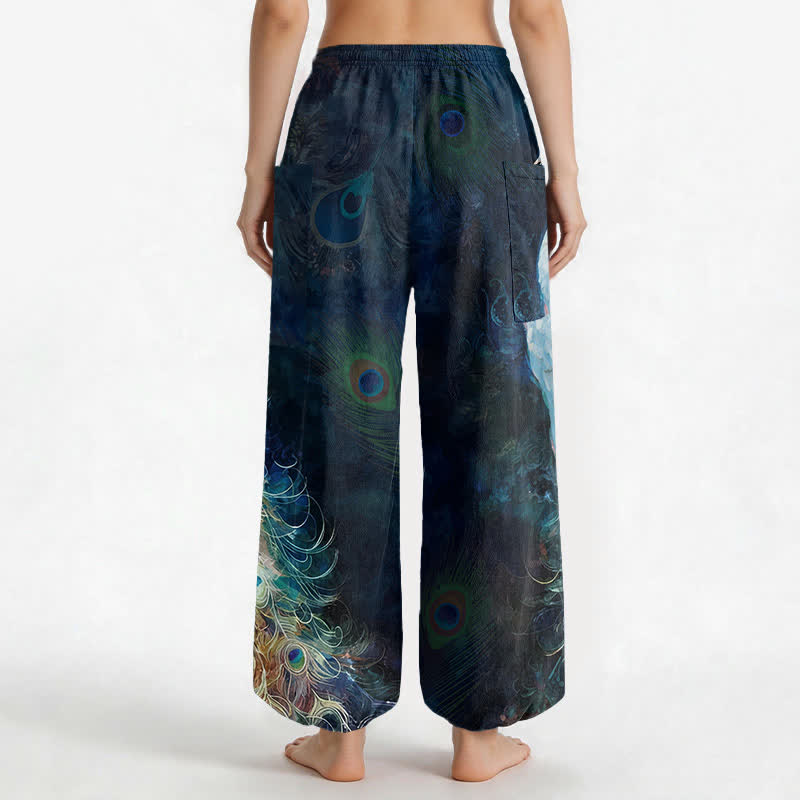 Buddha Stones Pantaloni harem da donna in cotone bianco con motivo a piume di pavone e vita elasticizzata, con tasche laterali. - image 2