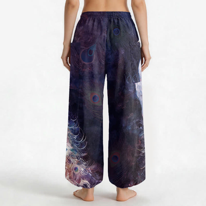 Buddha Stones Pantaloni harem da donna in cotone bianco con motivo a piume di pavone e vita elasticizzata, con tasche laterali. - image 9