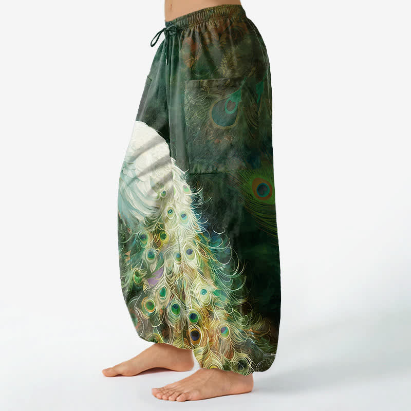 Buddha Stones Pantaloni harem da donna in cotone bianco con motivo a piume di pavone e vita elasticizzata, con tasche laterali. - image 11
