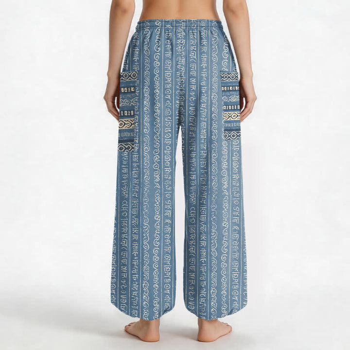 Buddha Stones Pantaloni harem da donna in cotone con elastico in vita e tasche laterali, fantasia a righe geometriche etniche. - image 2