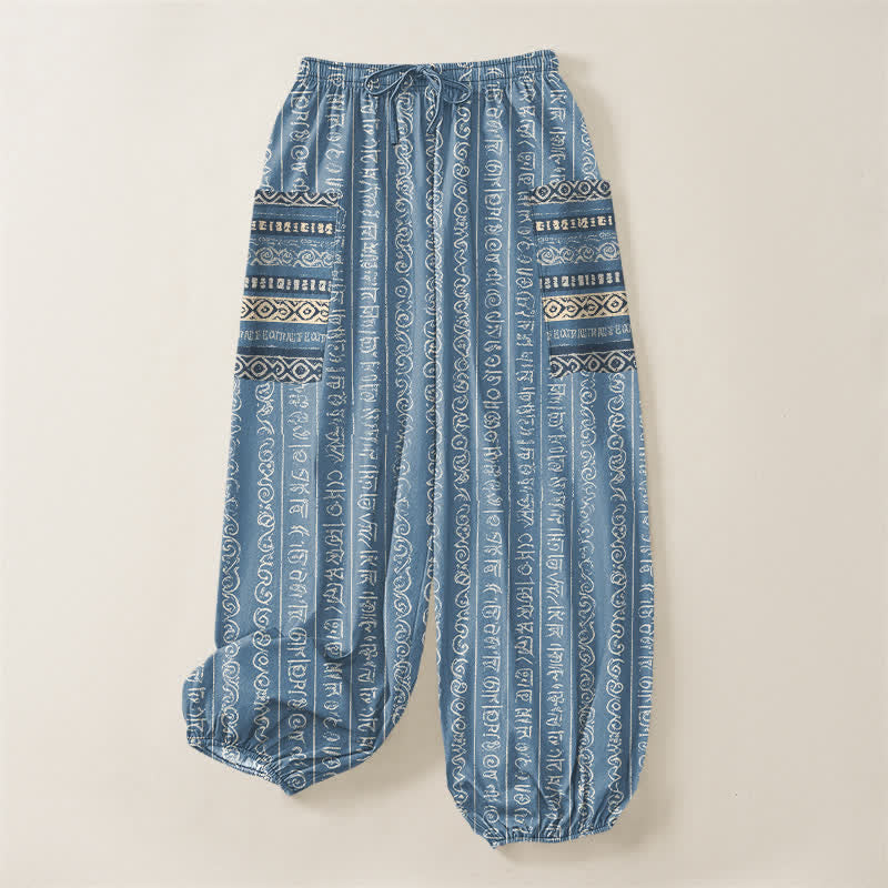 Buddha Stones Pantaloni harem da donna in cotone con elastico in vita e tasche laterali, fantasia a righe geometriche etniche. - image 3