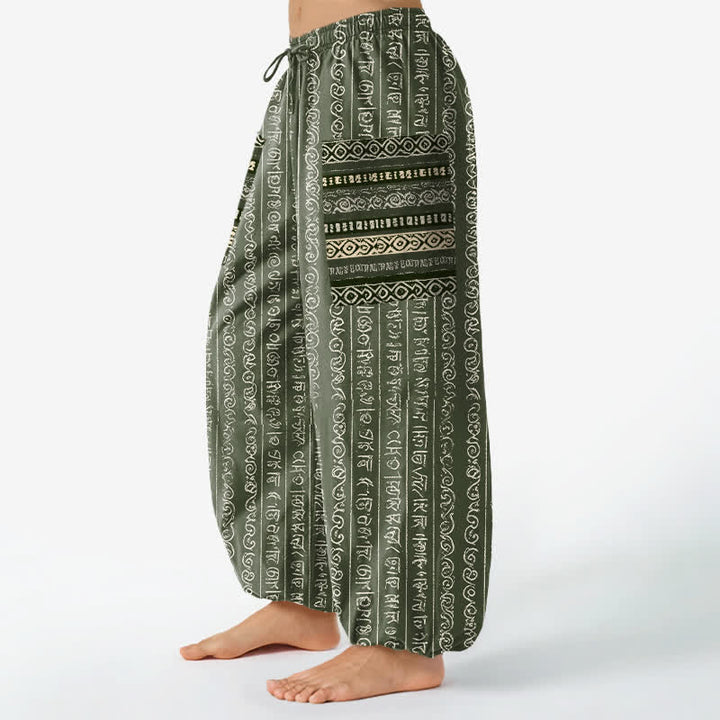 Buddha Stones Pantaloni harem da donna in cotone con elastico in vita e tasche laterali, fantasia a righe geometriche etniche. - image 8