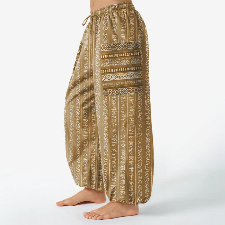 Buddha Stones Pantaloni harem da donna in cotone con elastico in vita e tasche laterali, fantasia a righe geometriche etniche. - image 11