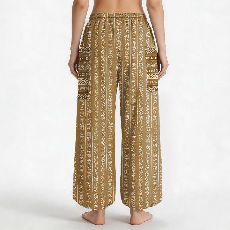 Buddha Stones Pantaloni harem da donna in cotone con elastico in vita e tasche laterali, fantasia a righe geometriche etniche. - image 12
