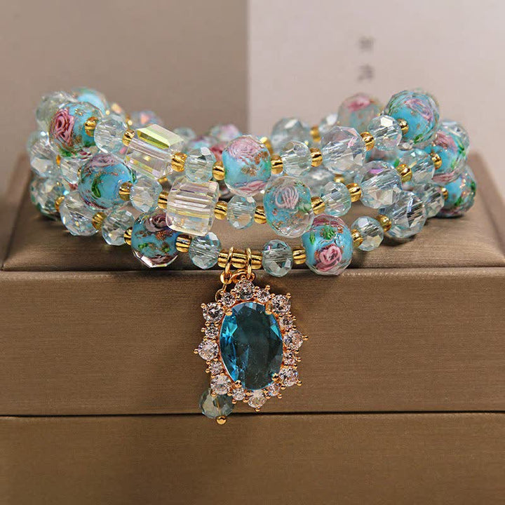 Buddha Stones Bracciale a triplo giro con ciondolo ovale floreale e perline di vetro Blue Liuli. - 5,9-6,3 pollici / 15-16 cm - image 0